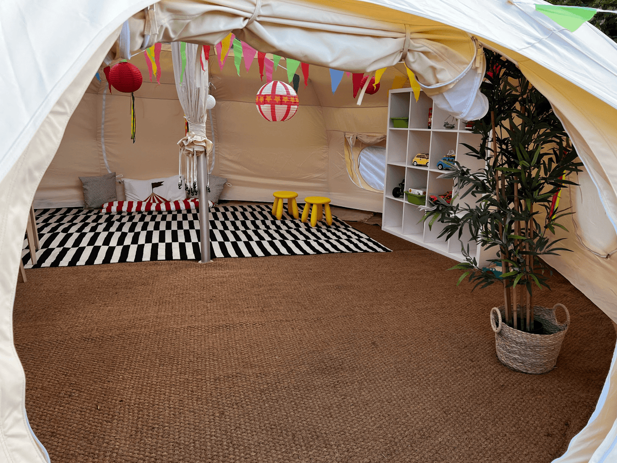 Tent Flooring - image of some Coir Matting installed in a luxury, canvas belle tent. A great way to add some extra luxury and insulation on your camping trips. Lotus Belle